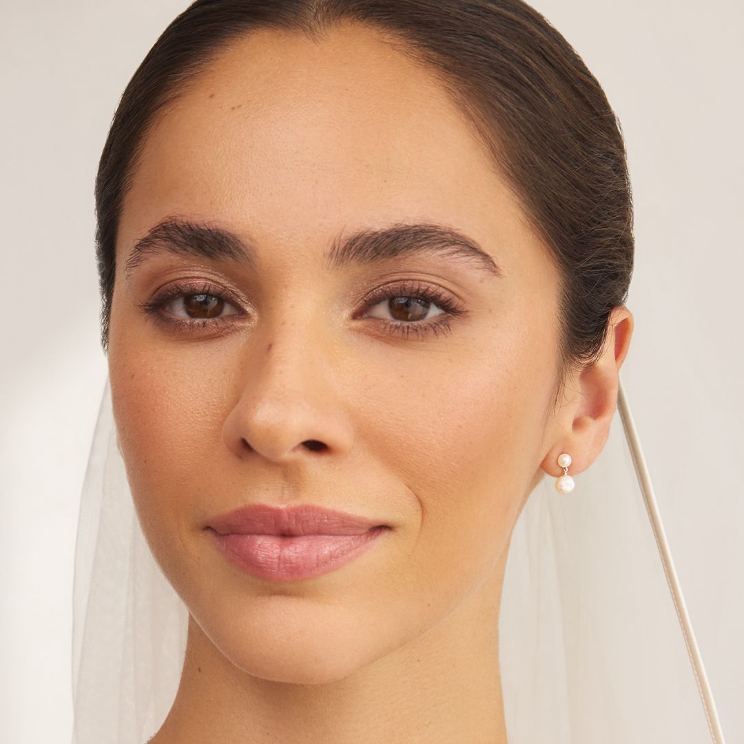 Silver-coloured double baroque-style pearl drop stud earrings