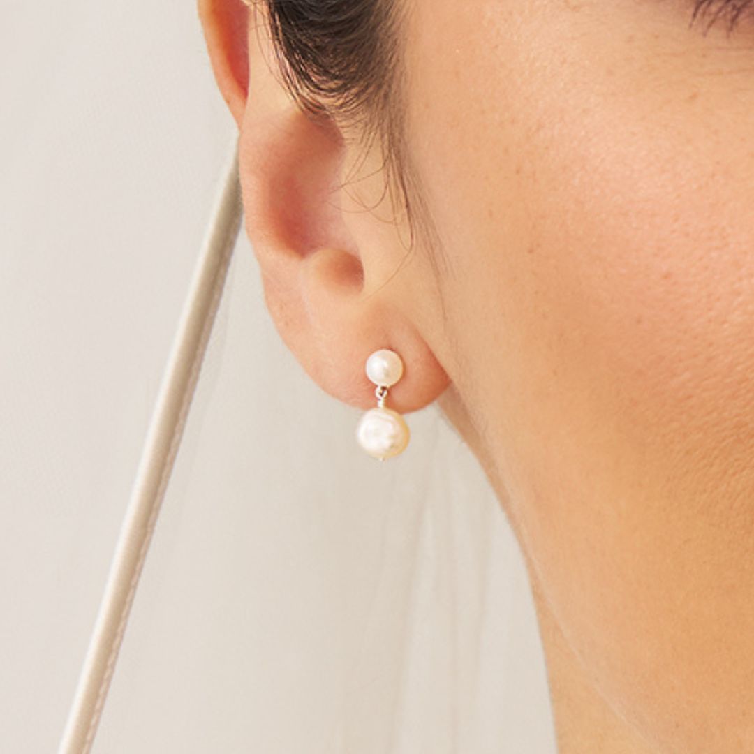 Silver-coloured double baroque-style pearl drop stud earrings