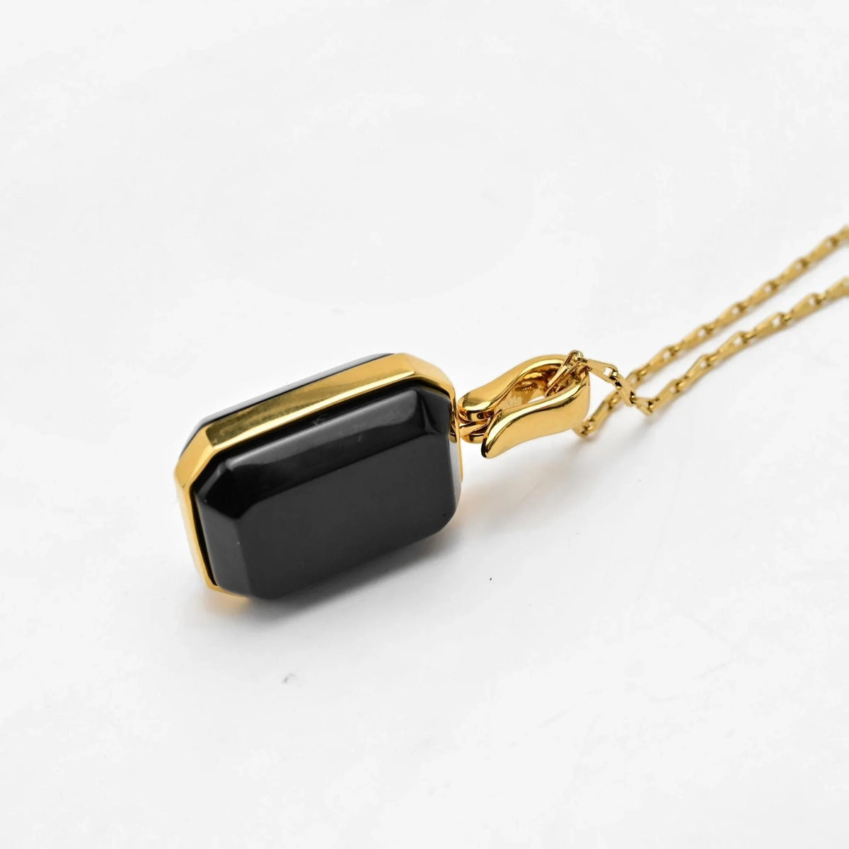 Marique Black Stone-Style Pendant Necklace in Gold-Tone