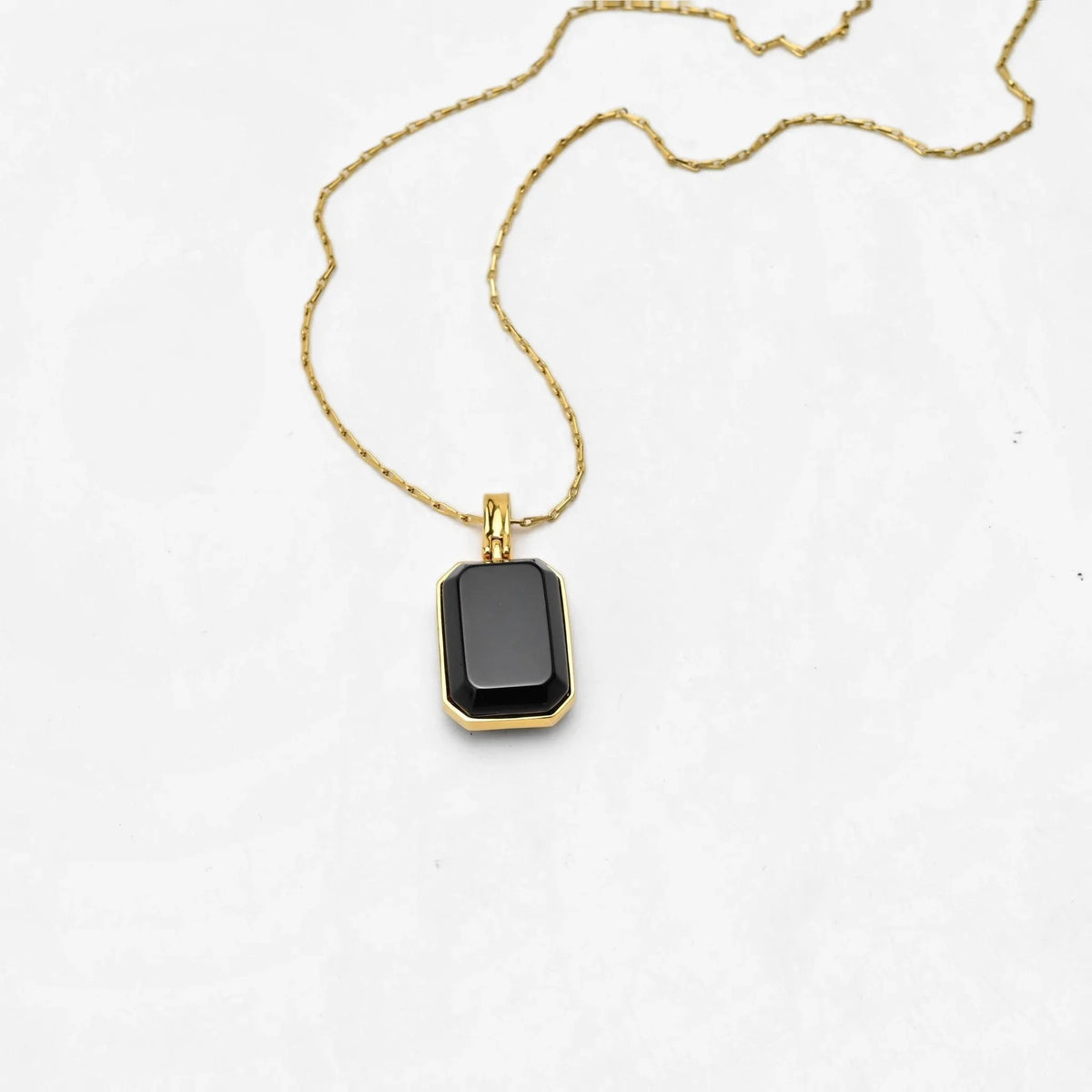 Marique Black Stone-Style Pendant Necklace in Gold-Tone