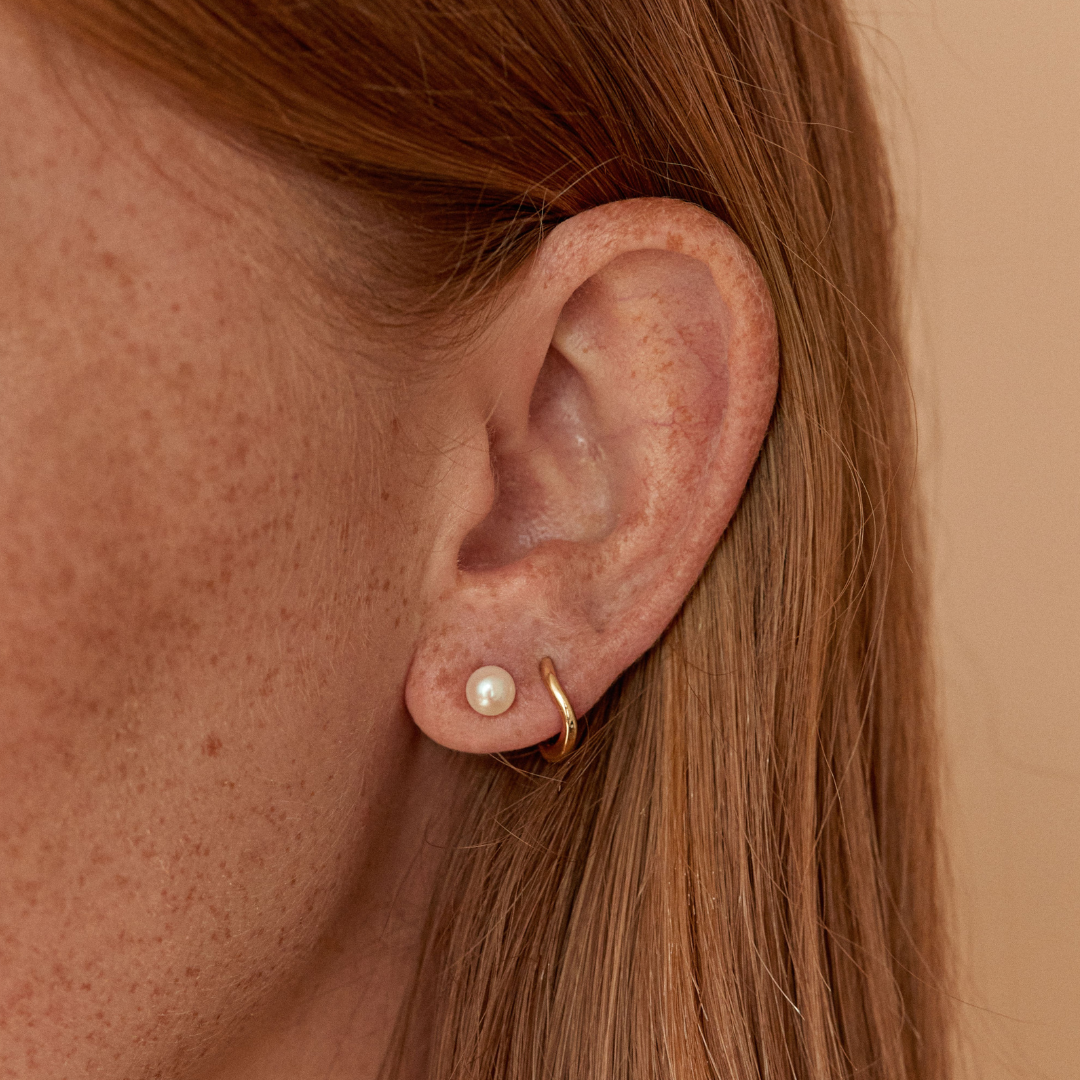 Gold-Tone Wave Huggie Hoop Earrings