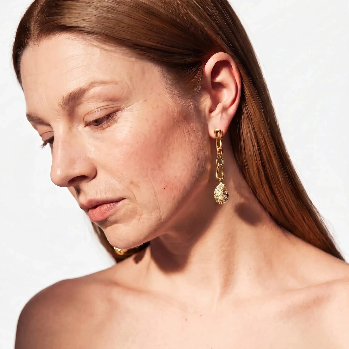 Gold-Tone Molten Crystal-Style Drop Earrings with Textured Accents